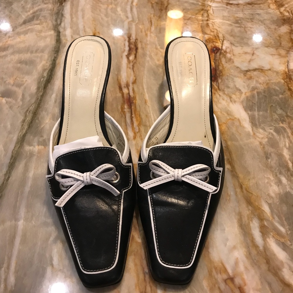 Authentic Coach leather mules.